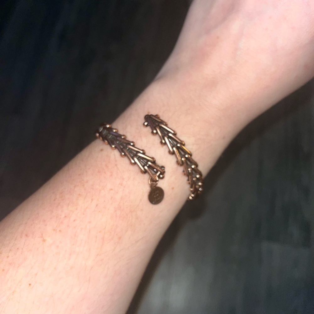 Alex and Ani rose-gold tone adjustable size bangle. Never worn with tags.
